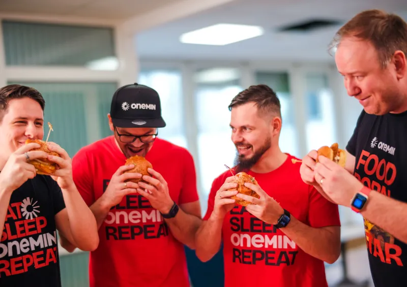 OneMin team enjoying food